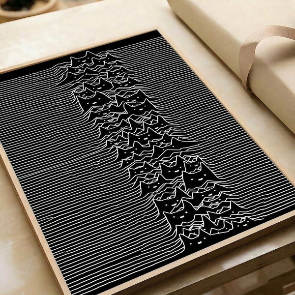 Meditative framed art print with a minimalist cat silhouette merging into flowing wave and peak designs, rendered in striking black on white.