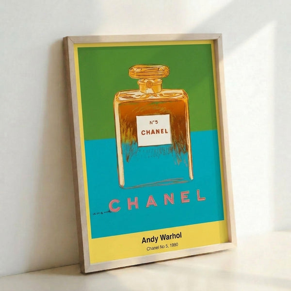 Pop art wall decor showing a striking perfume bottle design in black, red, and gold with bold graphic treatment characteristic of modern pop art.