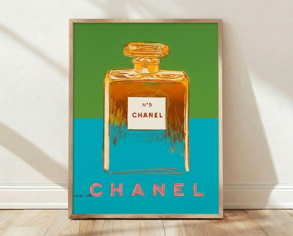 Pop art style framed poster of Chanel No. 5 perfume bottle in vibrant colors, iconic Warhol aesthetic wall art.