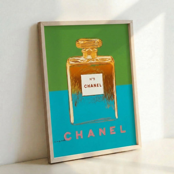 Vibrant pop art framed poster depicting the Chanel No. 5 perfume bottle in bright, contrasting hues.