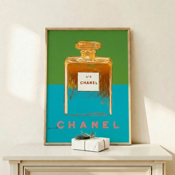 Chanel No. 5 bottle art print on wall in modern Warhol-inspired pop style with saturated color palette.