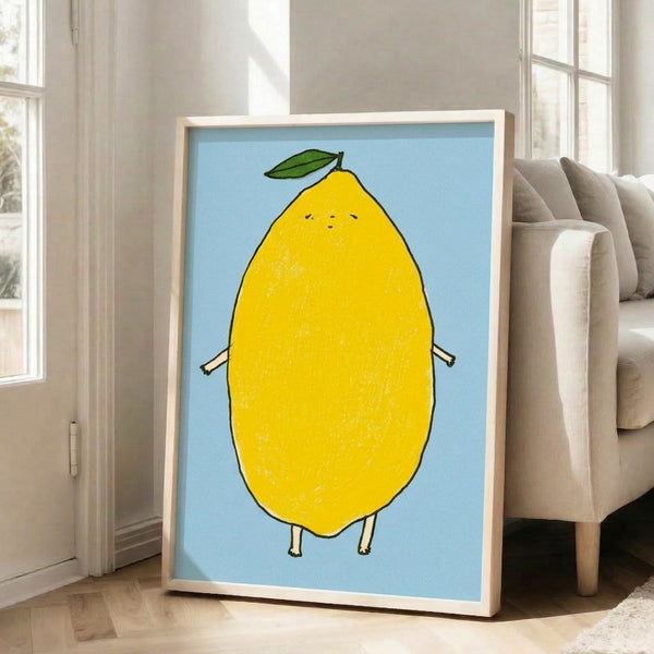 Whimsical lemon character illustration in black line art style with bright yellow coloring and green leaf detail on a soft blue backdrop, displayed as a framed wall print.