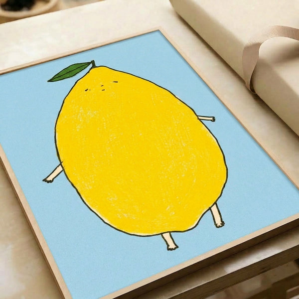 Framed charming lemon character print with playful black line work, vibrant yellow fill, and green leaf in a minimalist style on light blue—ideal whimsical home decor.