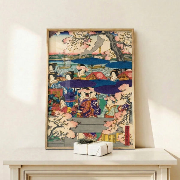 Elegant framed wall art in Japanese aesthetic: geisha figure in traditional dress aboard a boat with umbrella and flowering cherry branches in soft coral and blue palette.