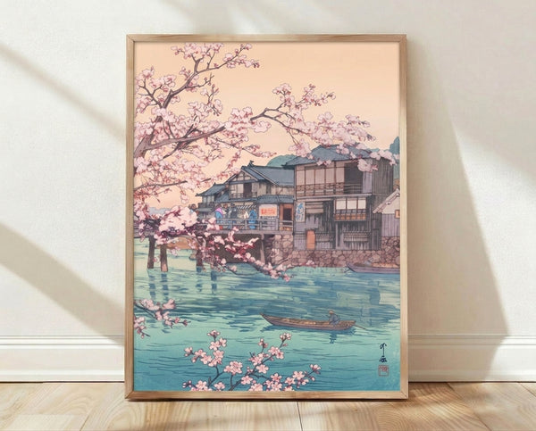 Serene Japanese woodblock-style poster depicting pale pink cherry blossoms along a turquoise river with a traditional teahouse and small boat, rendered in soft cream and sage green tones.