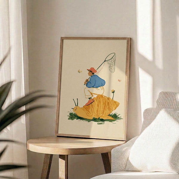 Folk art style framed poster depicting a young dreamer perched on a whimsical snail with butterfly net in hand, set among wildflowers in a palette of soft creams, coral, blue, and golden tones.