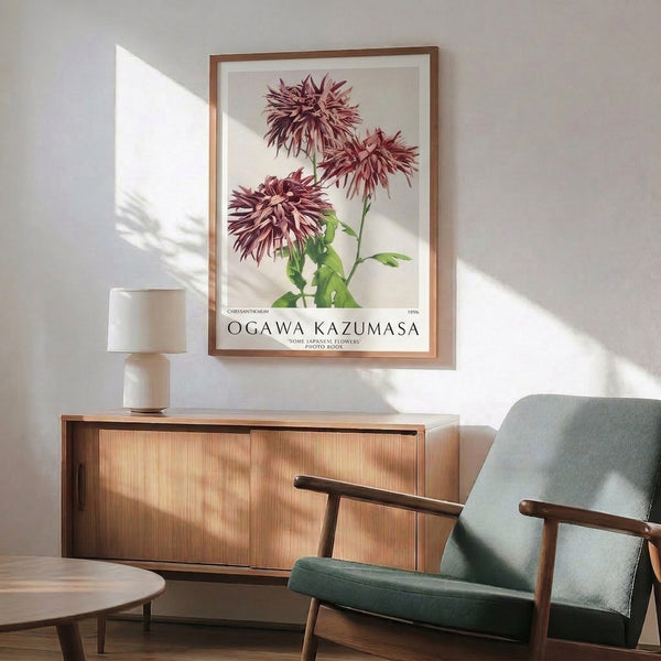 Framed vintage floral poster depicting a single chrysanthemum with detailed petals in muted mauve and burgundy hues, surrounded by green botanical elements.