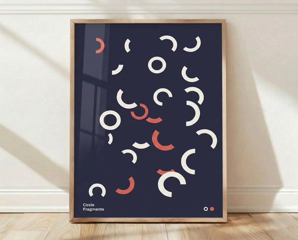 Framed Bauhaus-inspired poster featuring geometric circle fragments in navy blue and coral red on a cream background, conveying calm minimalist design.