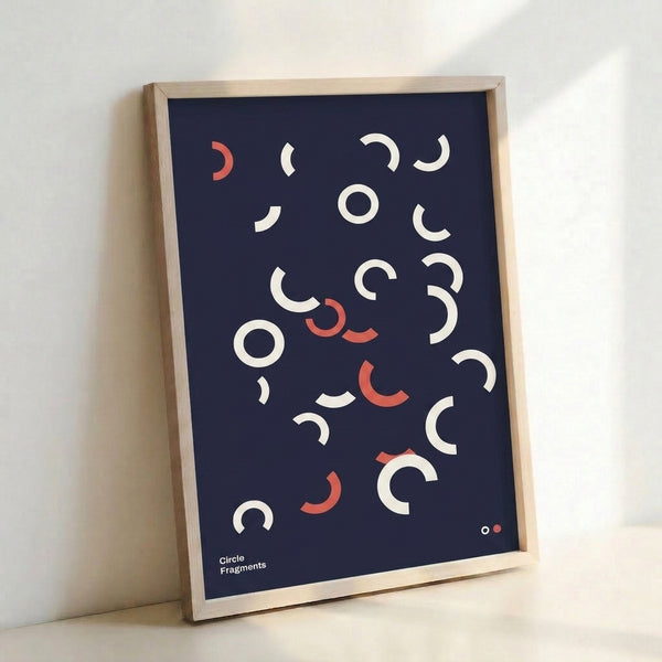 Minimalist geometric poster displaying fragmented circles in navy blue and coral red, creating a contemplative, balanced abstract composition on cream.