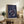 Contemporary poster of geometric circle fragments in navy, coral, and cream, reflecting modernist Bauhaus design with serene systematic balance.