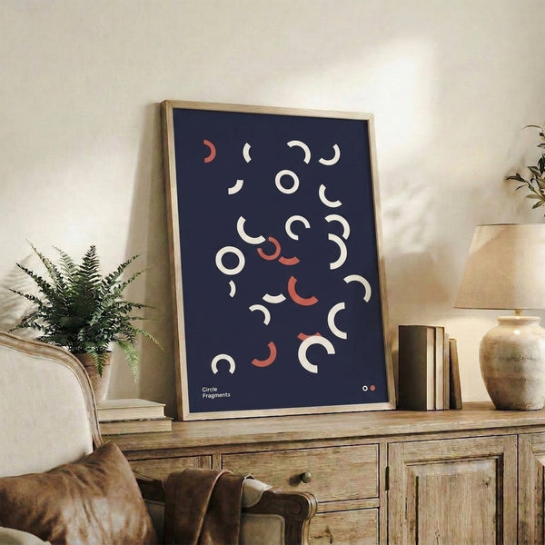 Contemporary poster of geometric circle fragments in navy, coral, and cream, reflecting modernist Bauhaus design with serene systematic balance.