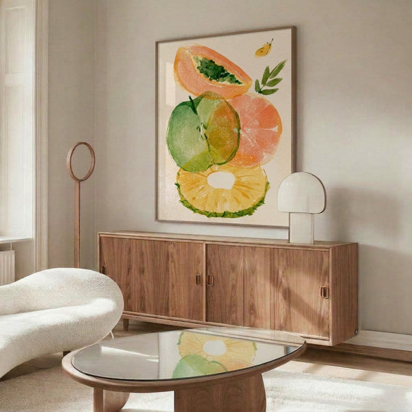 Organic watercolor poster art depicting stacked grapefruit, lime, and pineapple with botanical elements and a butterfly in peachy, yellow, and green tones.