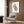 Meditative poster with classical Japanese aesthetic, displaying a refined feather and leaf pattern as elegant black lines on cream background, framed.