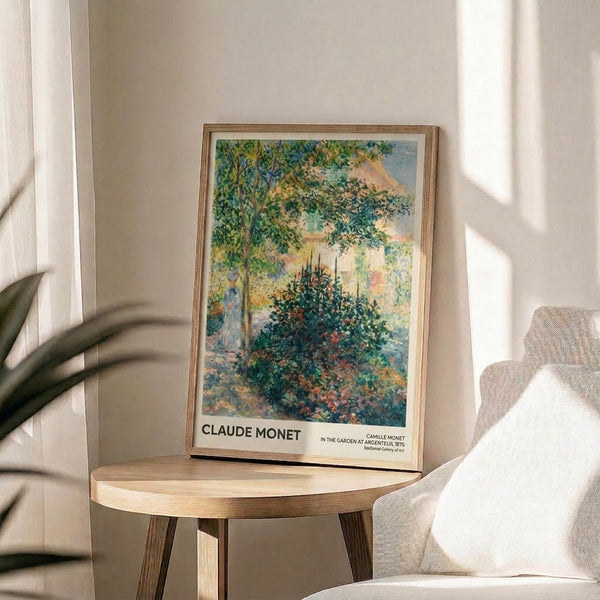 Framed Impressionist print of a solitary figure in a sunlit garden with luminous flowers and trees, rendered in muted rose pink, cream, and green hues.