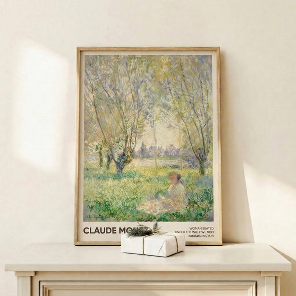 Framed impressionist print showing a contemplative seated figure beneath drooping willows in a serene landscape with pale yellow and lavender washes.