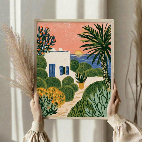 Idyllic Mediterranean cottage wall art depicting a peaceful coastal scene with a house, palm tree, flowering garden, and distant sea under a golden sunset sky in soft, warm tones.