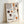 Cream and tan line art poster illustrating a coffee brewing moment with kettle and cup, accented by orange and brown details for a serene kitchen aesthetic.