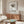 Whimsical home office wall art combining quirky coffee cup line drawings and turtle character in warm, neutral earthy tones.