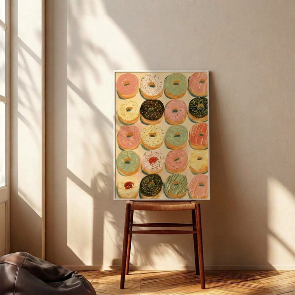 Minimalist modern donuts wall art featuring a vibrant grid layout in warm and cool tones, cheerful kitchen décor print with appetizing pastry illustrations.
