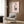 Cream and blush pink wall art featuring minimalist black line illustrations of people, creating an understated and serene aesthetic.
