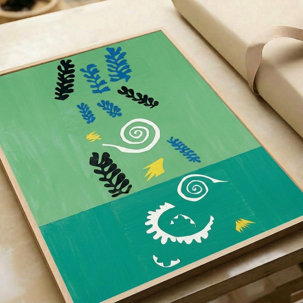 Abstract wall art print showcasing organic paper-cut style shapes in coral, gold, and blue tones positioned on a calming green compositional space.
