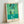 Henri Matisse-inspired abstract wall art with vibrant color fields, organic forms, and inventive geometric elements in green and warm accents on a light background.
