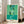Minimalist modern art print with abstract shapes in vibrant green hues, white space, and warm accent colors arranged in an inventive, visually rhythmic design.
