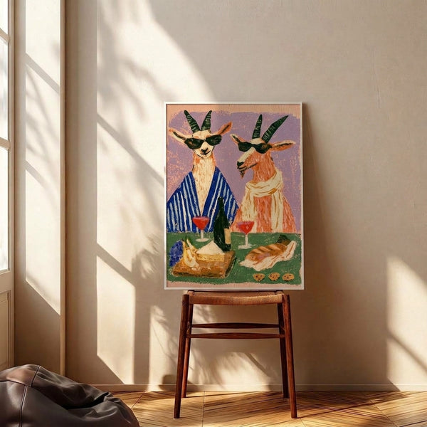 Whimsical folk art wall poster depicting a sunglasses-wearing goat amidst wine, grapes, and picnic fare in a sophisticated retro palette of lavender and warm earth tones.