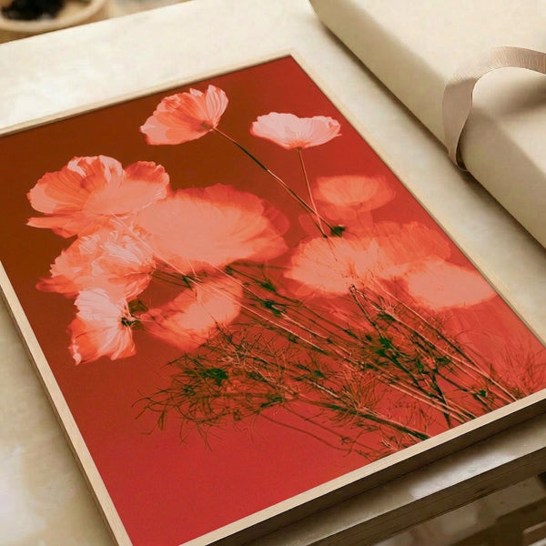 Serene watercolor floral print of cosmos flowers in warm coral and salmon shades with muted green accents, displayed as framed botanical wall art in modern minimalist style.
