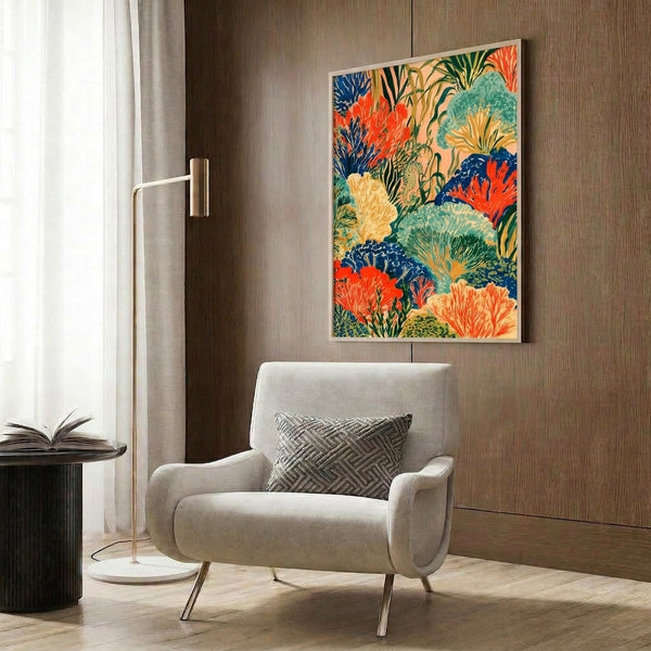 Tropical underwater scene poster featuring an ornamental seahorse amid blooming coral formations and seaweed in a sophisticated palette of coral red, golden yellow, navy, and seafoam, hung as framed wall decor.