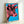 Framed pop art poster showcasing a striking cow design in warm orange hues set against cool blue, bold and energetic modern aesthetic.