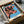 Framed contemporary pop art of a stylized cow in vibrant orange and blue with bright accents, modern wall art with ironic edge.