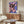 Contemporary pop art wall print featuring a pink cow silhouette on purple background, executed in bright, eye-catching color contrast.