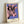 Vibrant pop art wall art with a cow head rendered in hot pink and white on a deep purple ground, capturing the bold spirit of modern pop imagery.