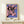 Contemporary pop art poster showing a playful cow face in contrasting pink and black strokes against a purple backdrop.