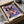 Colorful pop art wall poster depicting a cow head in bright pink tones set against vibrant purple, embodying playful modern art sensibility.