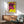 Contemporary pop art wall print showing a cow head in hot pink against golden yellow background, executed in bold graphic style.