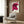 Iconic pop art cow design in red and white on a neutral background, vibrant modern animal portrait displayed as a wall print.