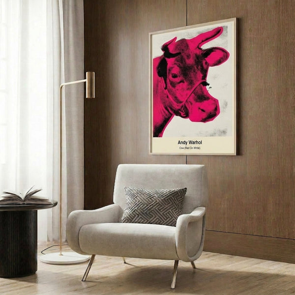 Iconic pop art cow design in red and white on a neutral background, vibrant modern animal portrait displayed as a wall print.