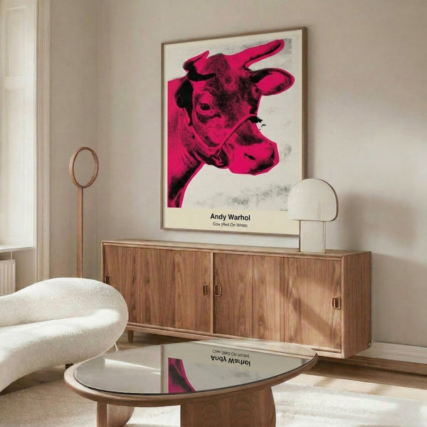 Subversive red and white cow artwork in pop art style with bold graphic impact, framed contemporary wall art for modern spaces.