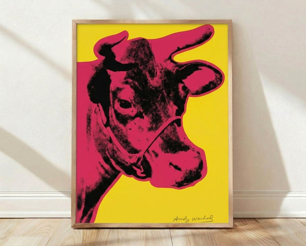 Bold pop art cow print in vivid red and yellow, a vibrant contemporary wall poster celebrating iconic modern art.