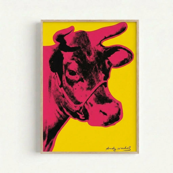 Framed poster featuring a striking red cow silhouette against a bright yellow background in pop art style.