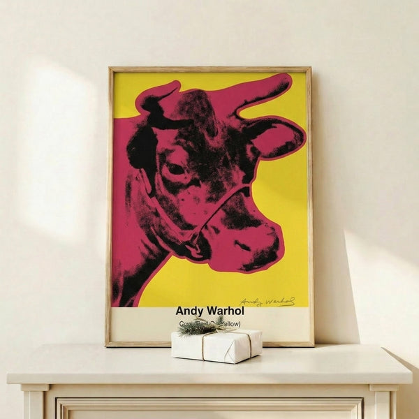 Contemporary pop art poster displaying a cow's face in bold primary colors—red and yellow—with stark black contours and minimalist Bauhaus composition.