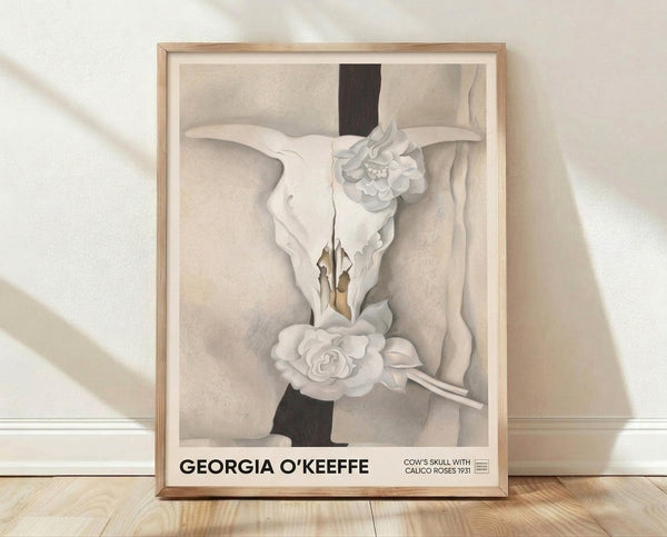 Abstract minimalist poster featuring a bleached cow skull centered with delicate calico roses in cream, tan, and gray tones against a soft white background.