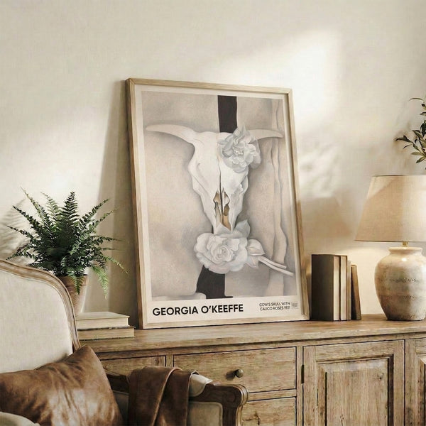Ethereal poster showcasing skeletal and botanical elements merged in minimalist style with gentle rose patterns in warm whites and grays.
