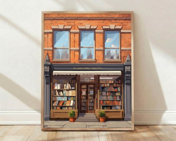 Framed minimalist poster of a warm brick bookstore storefront with large windows, soft blue sky, and green plant accents in sage and cream tones, evoking cozy literary nostalgia.