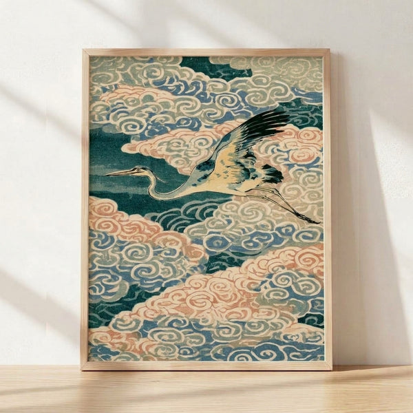 Traditional Japanese woodblock print featuring a serene crane in flight among soft clouds, rendered in deep teal, cream, and coral tones with pale blue sky and gold accents, framed as wall art.