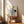 Japandi wall art print depicting a poised crane and blue porcelain pitcher in black ink on cream, evoking wabi sabi simplicity and zen tranquility.