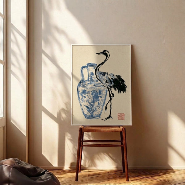 Japandi wall art print depicting a poised crane and blue porcelain pitcher in black ink on cream, evoking wabi sabi simplicity and zen tranquility.