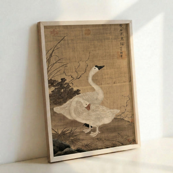 Contemplative crane artwork framed on wall, featuring graceful birds nestled in vegetation with naturalistic elegance characteristic of classical Japanese art.